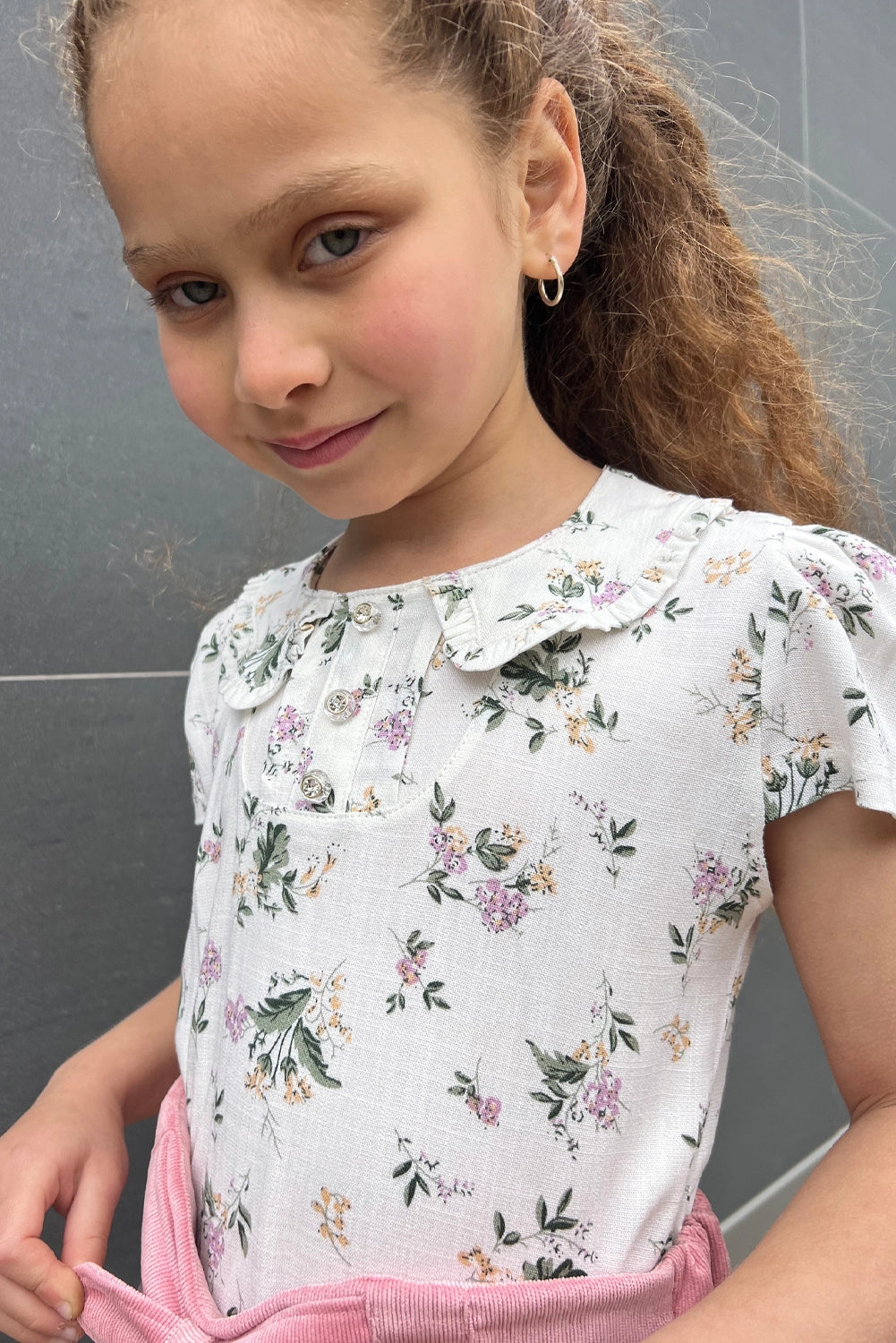 Blusa Floreada con Cuello Bebé