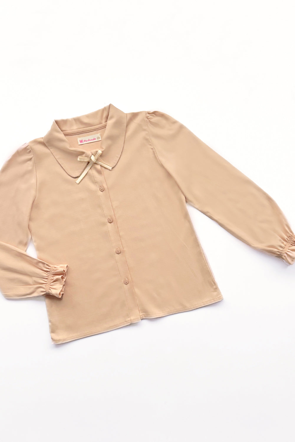BLUSA CON CUELLO CAMISERO Y PUÑOS CON VOLANTES ELASTICADOS