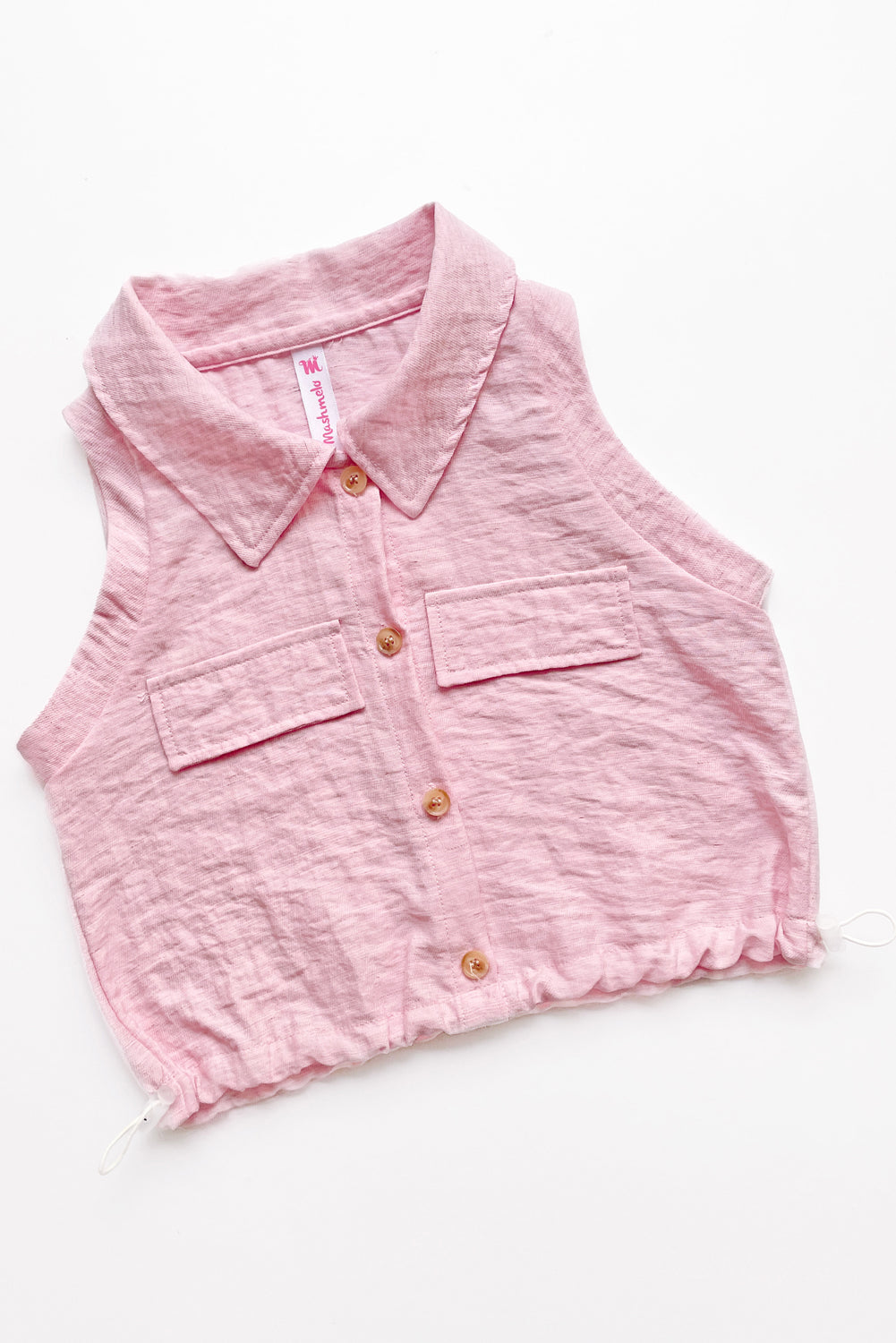 Blusa abierta manga cero con cuello camisero y elasticado en basta