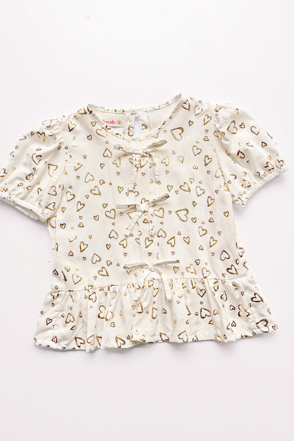 Blusa manga corta con Lazitos en delantero y bello faldon recogido
