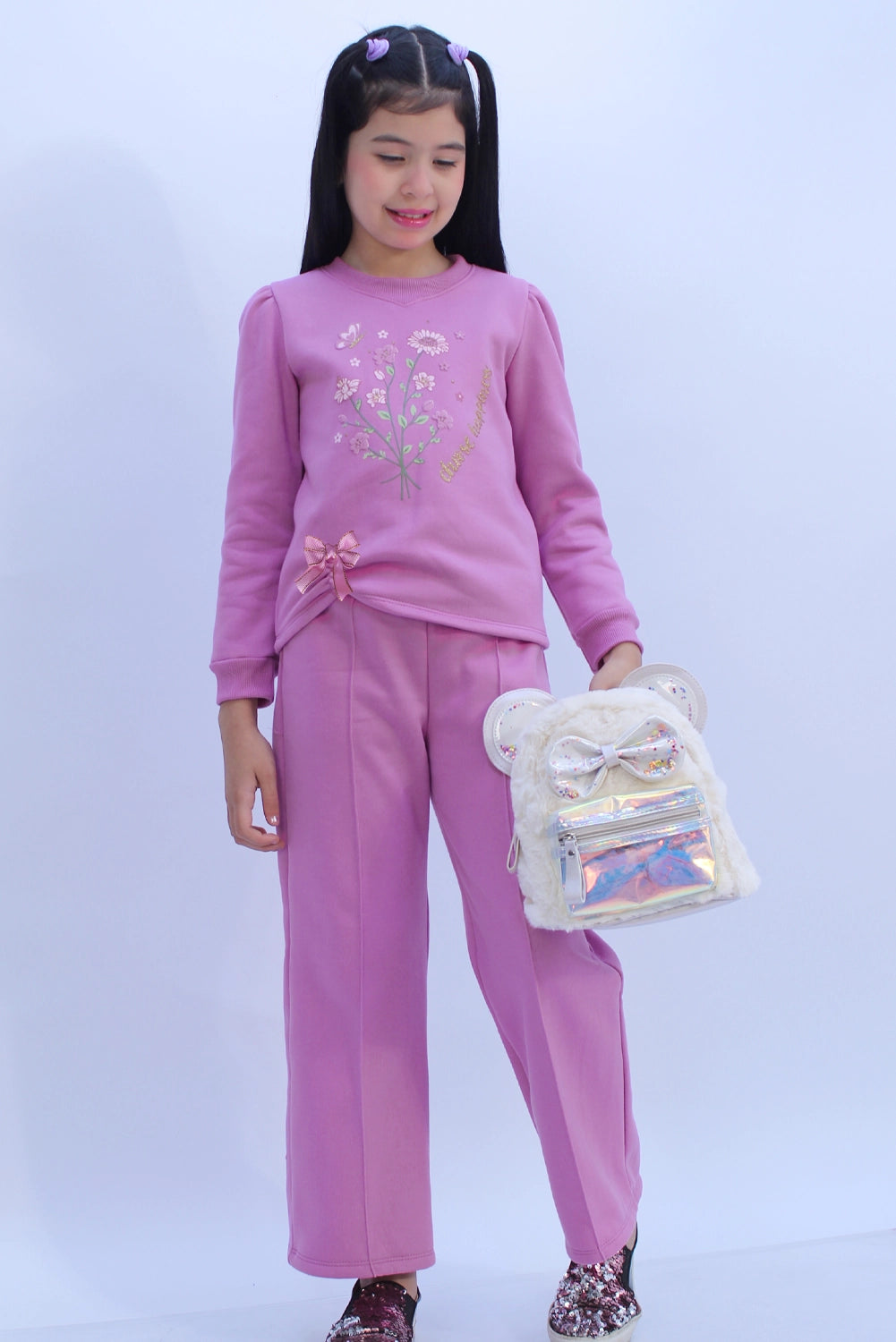 Conjunto buzo en franela con lazo en la basta