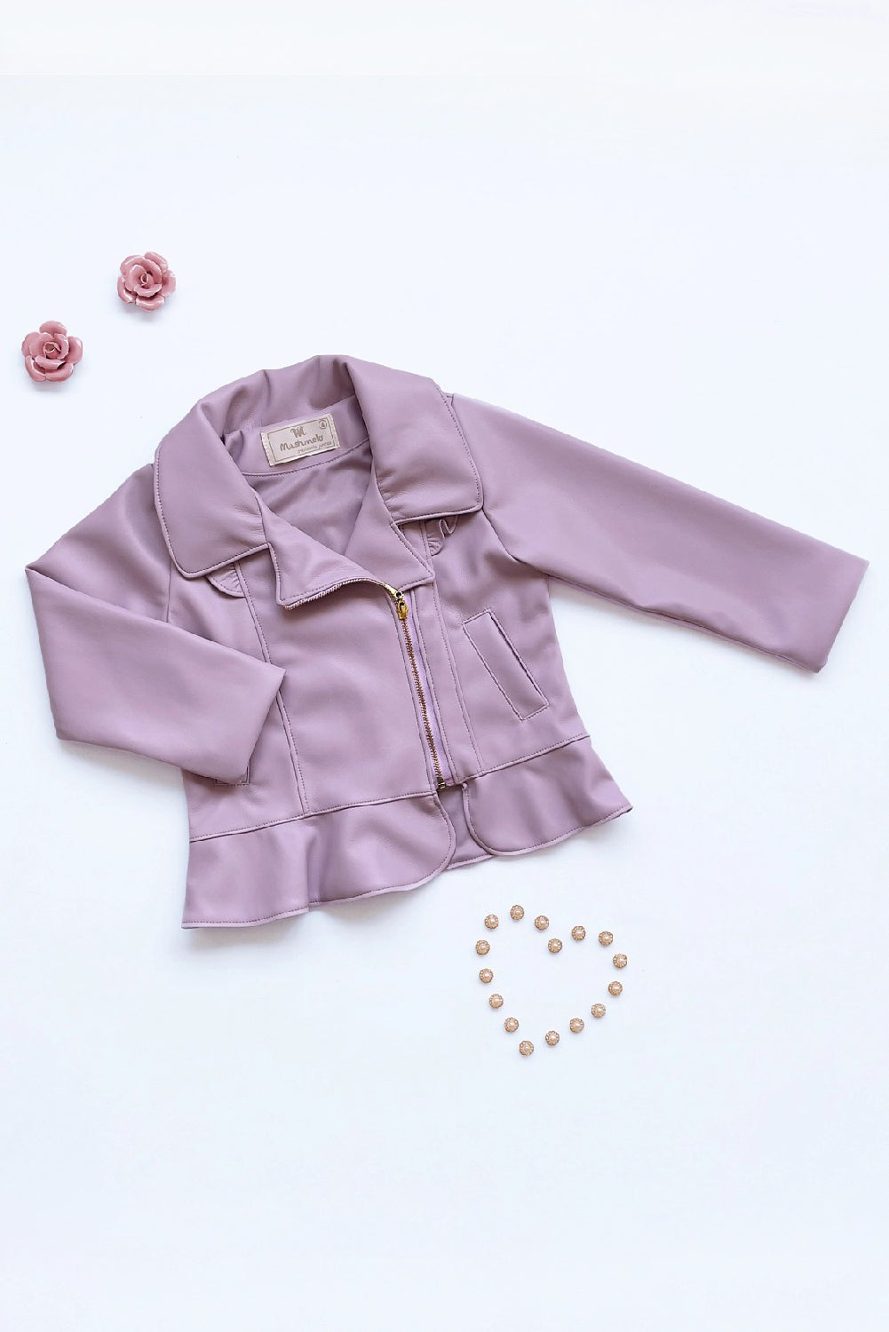 Chaqueta en cuerina con volantes