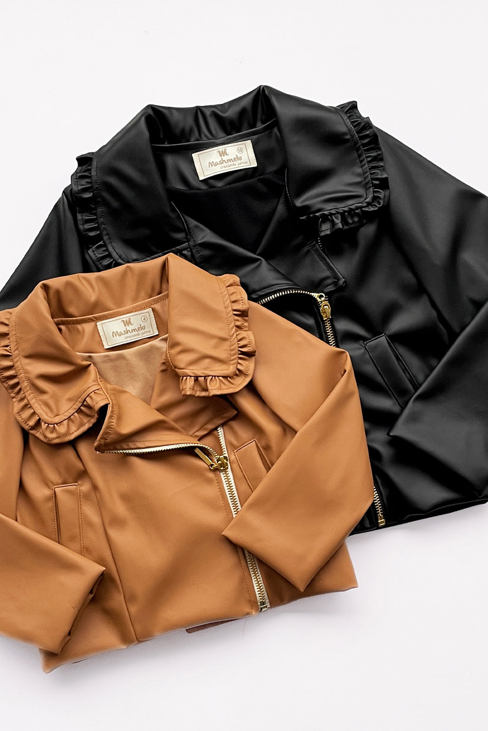 CHAQUETA DE CUERINA CARNERO DE CUELLO ALTO CON BOLSILLOS