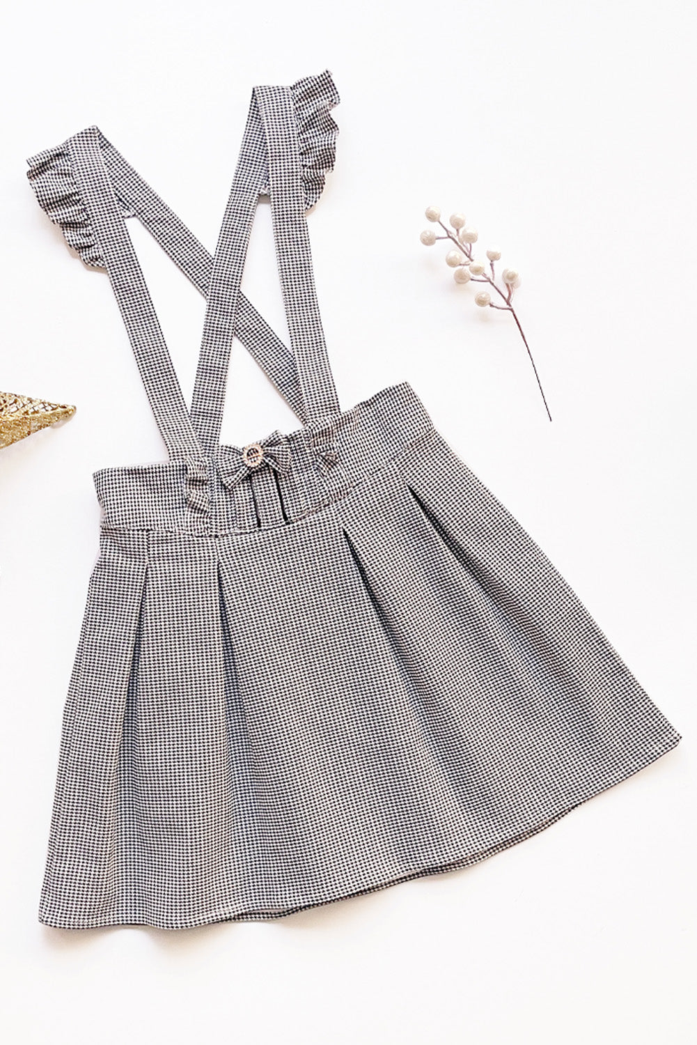 Jumper de cuadros con pretina en V y tableros