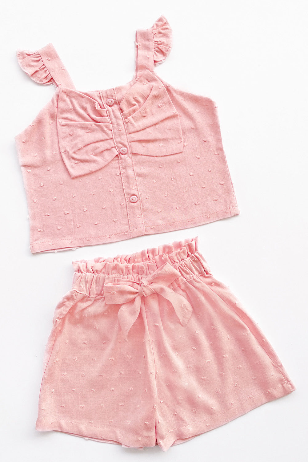 Set de blusa con forma de lazo en pecho y short con lazo en pretina