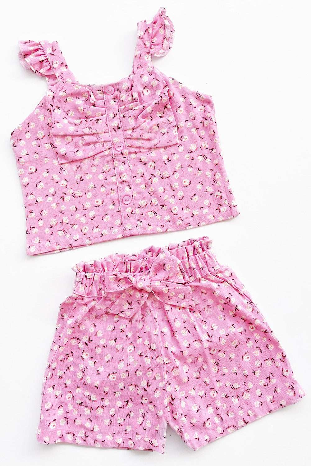 Set de blusa con forma de lazo en pecho y short con lazo en pretina