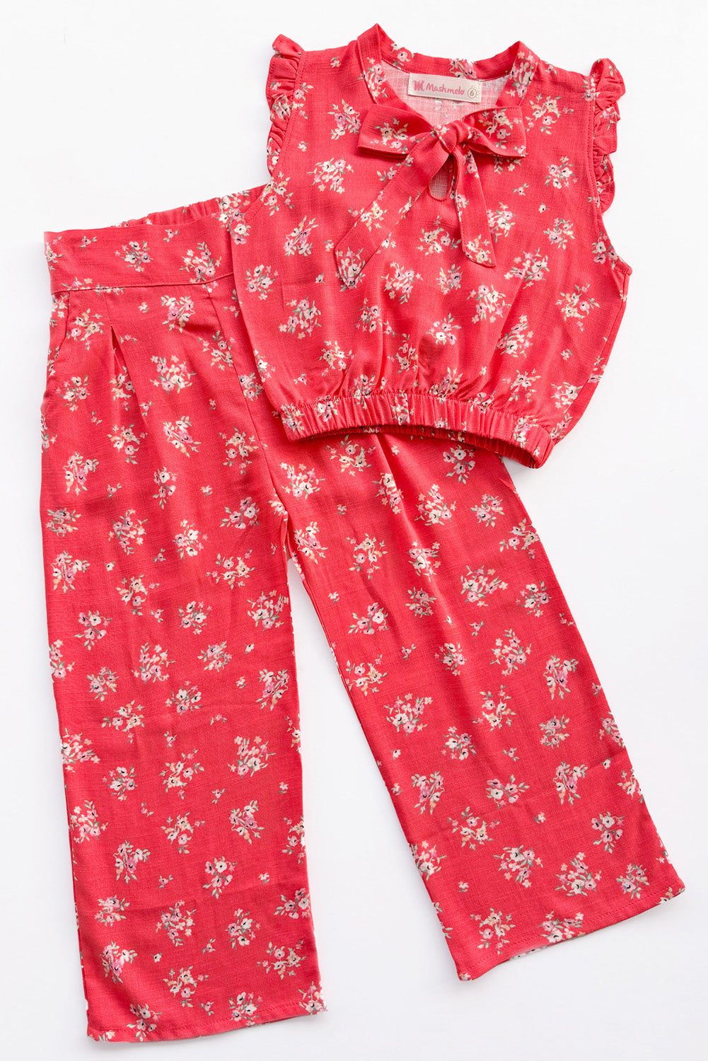 Set de blusa con mangas tipo alitas y pantalón con pinzas