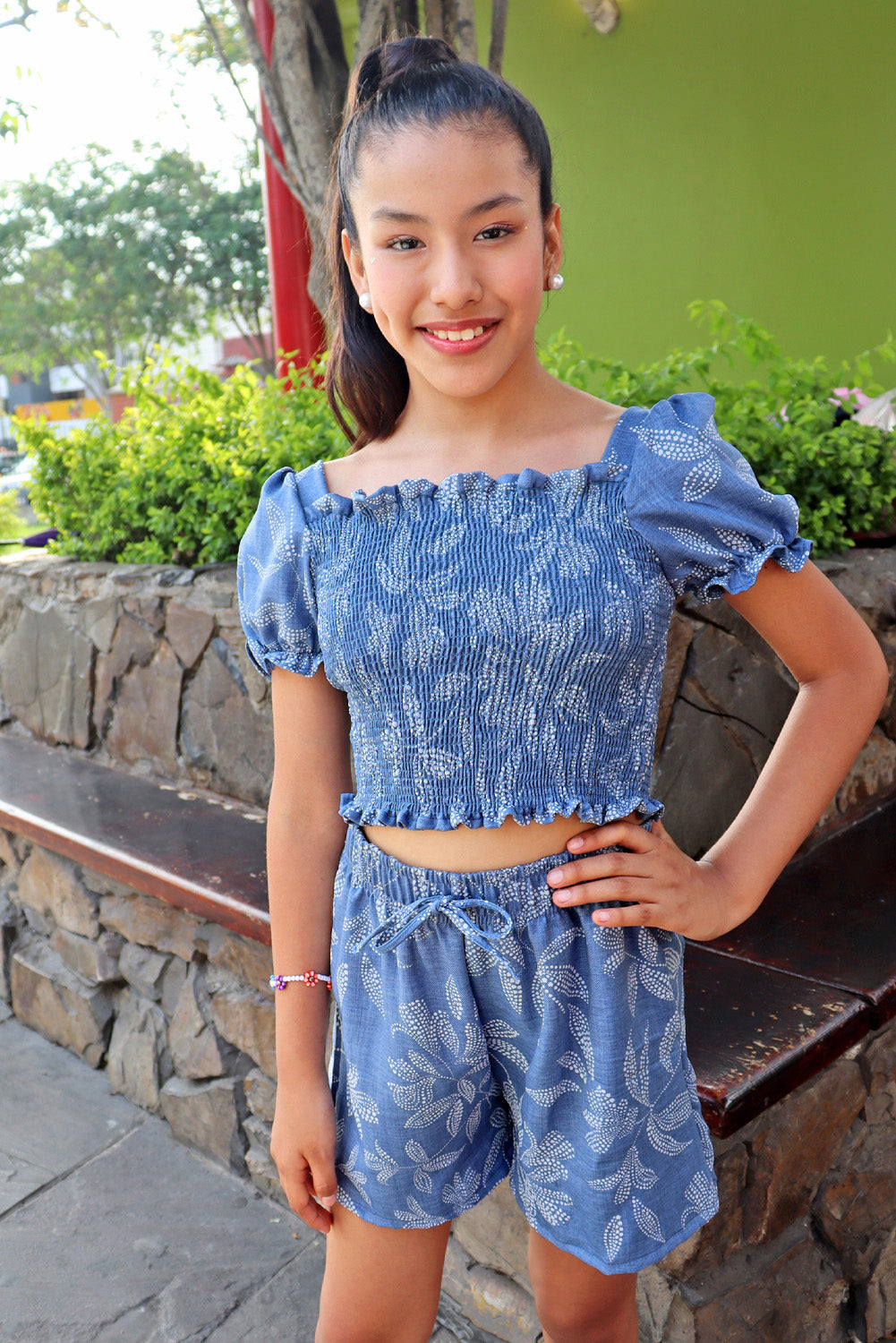 Set de blusa multiaguja y short con bolsillos