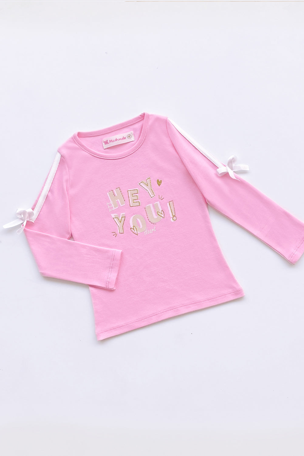 POLO ESTAMPADO CON TAPETE Y LAZITOS EN MANGAS