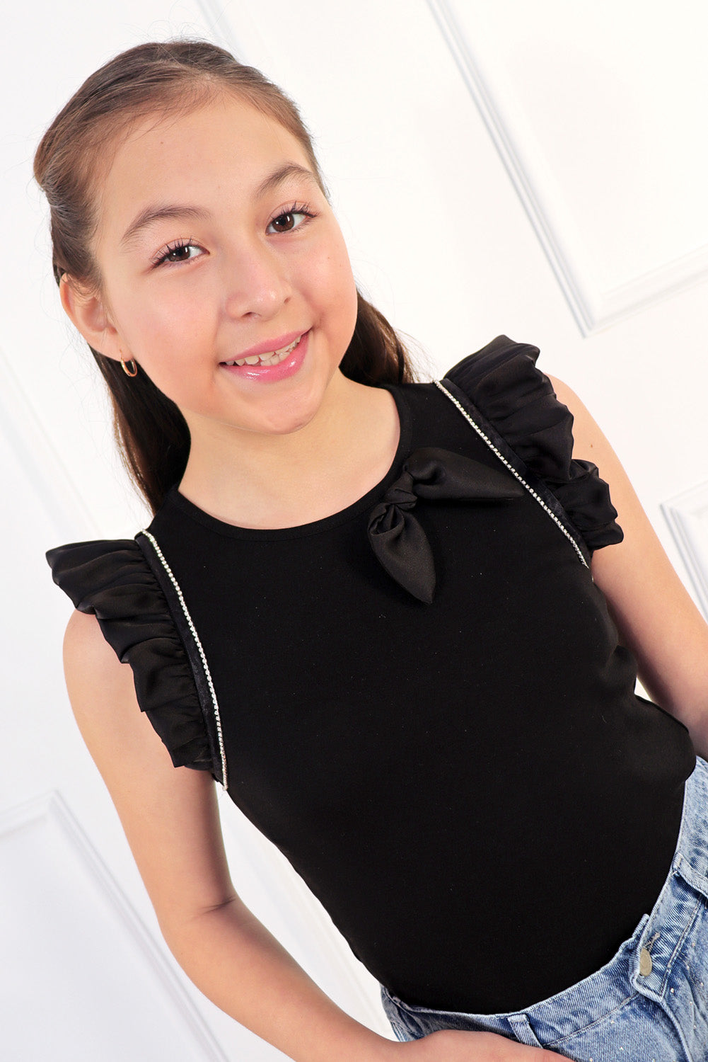 Polo con alitas de seda y strass