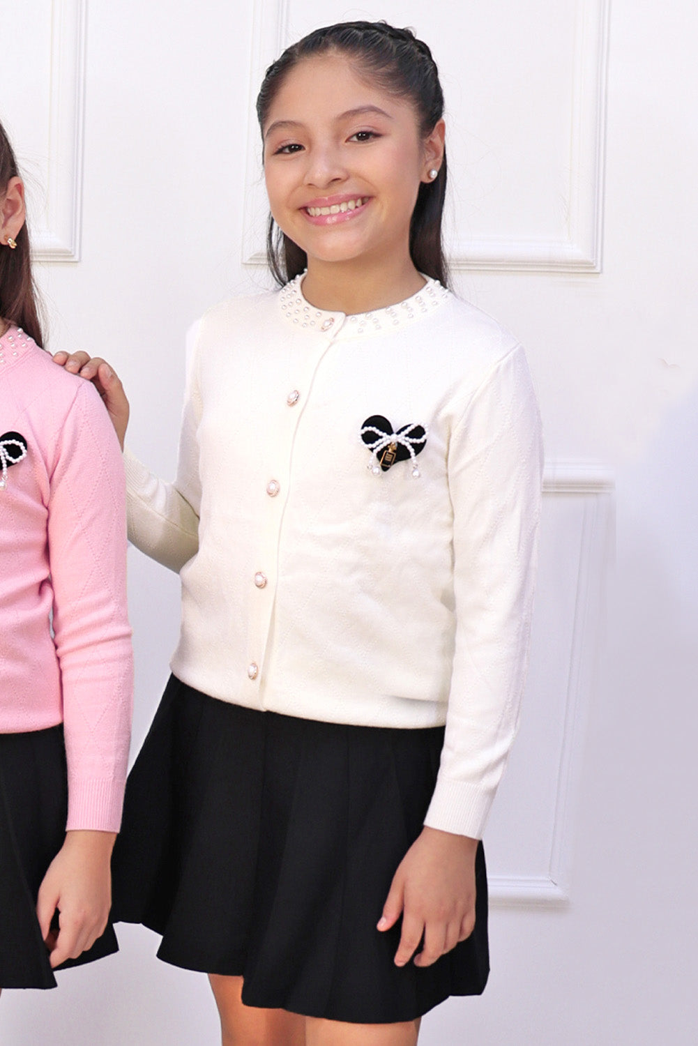 Set de Chompa con Perlas y Falda Tableada