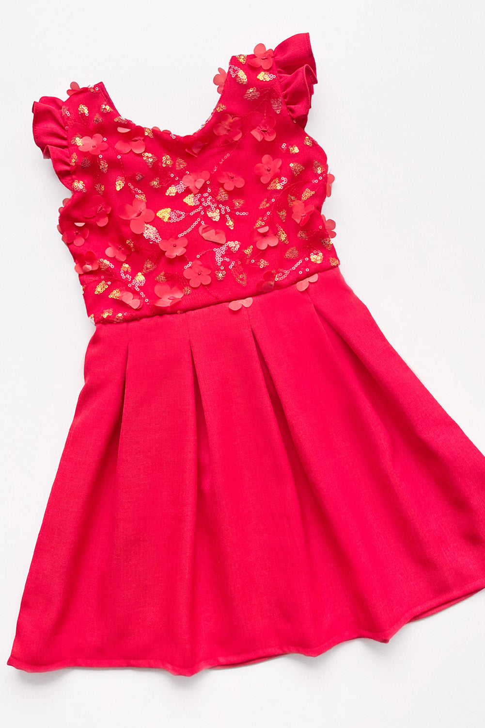 Vestido con Lentejuelas y Faldón de Tableros