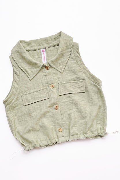 Blusa abierta manga cero con cuello camisero y elasticado en basta