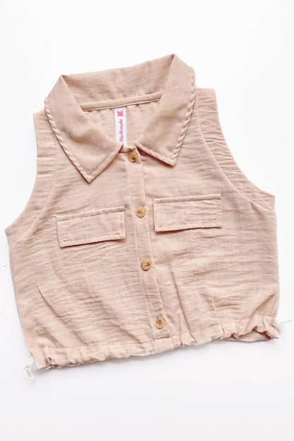 Blusa abierta manga cero con cuello camisero y elasticado en basta