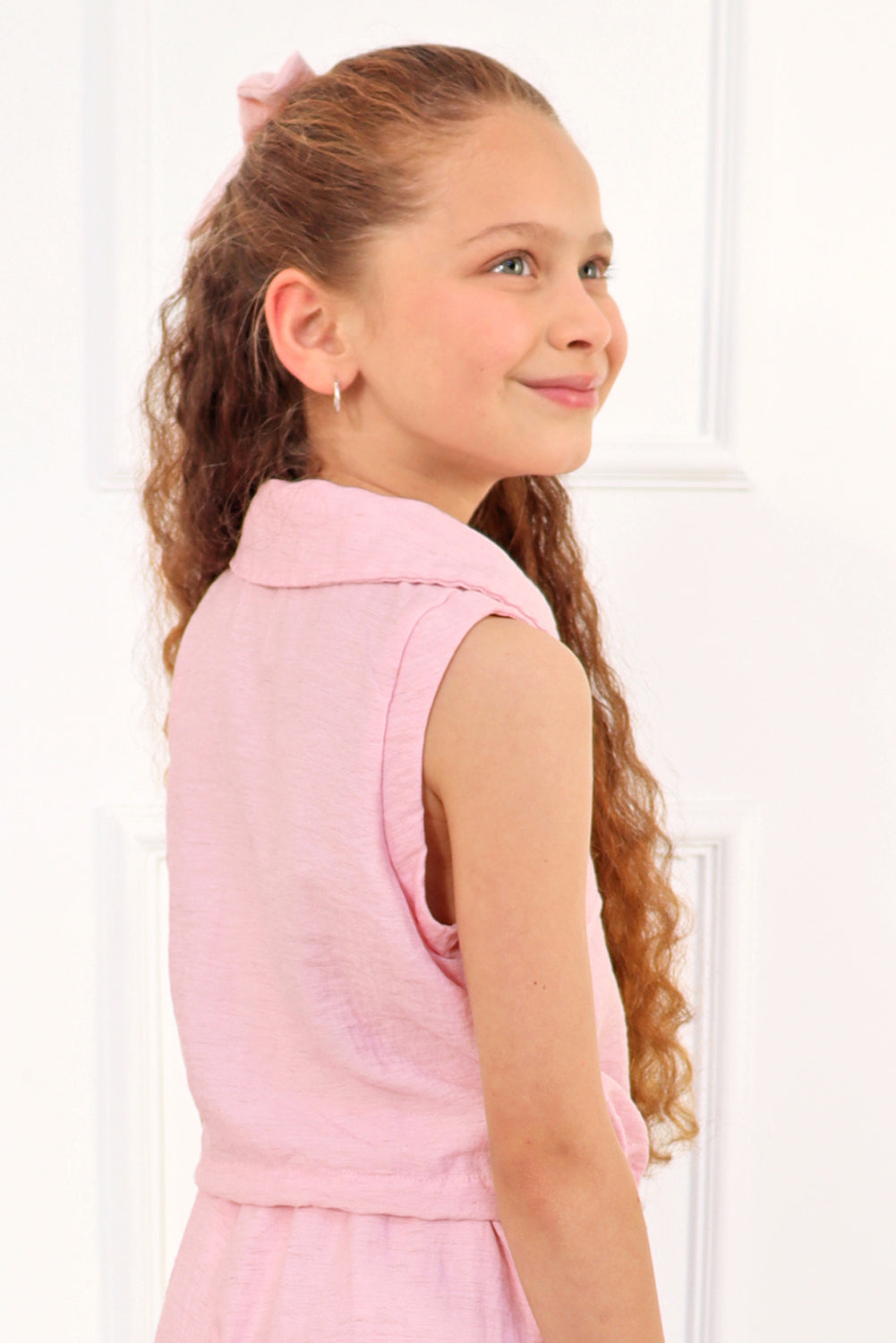 Blusa abierta manga cero con cuello camisero y elasticado en basta