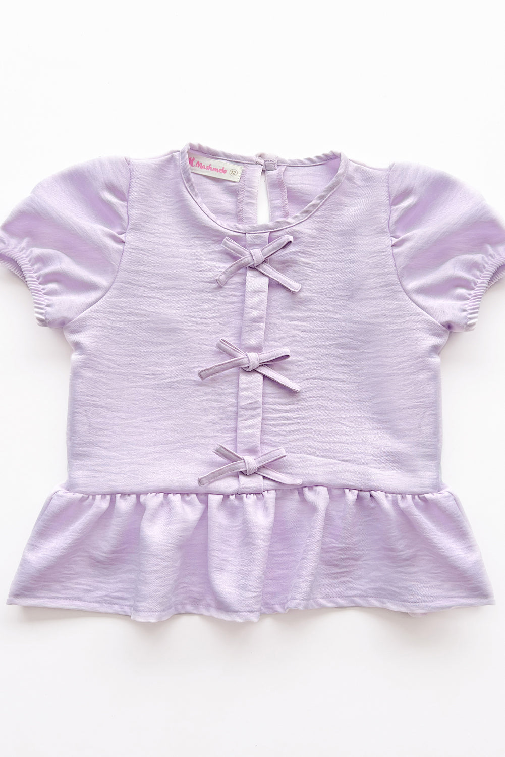 Blusa manga corta con Lazitos y bello faldon recogido