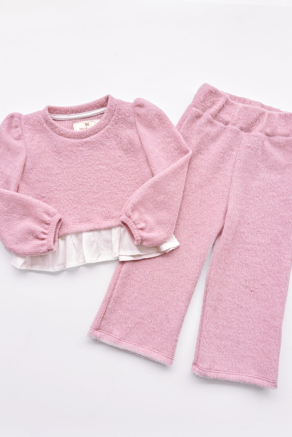 CONJUNTO CHOMPERO CON MANGAS ABULLONADAS Y FALDON DE LINO Y BUZO PALAZO