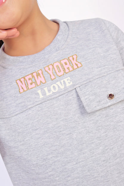 CONJUNTO DE POLERA CON ESTAMPADO Y BUZO CARGO ELASTICADOS