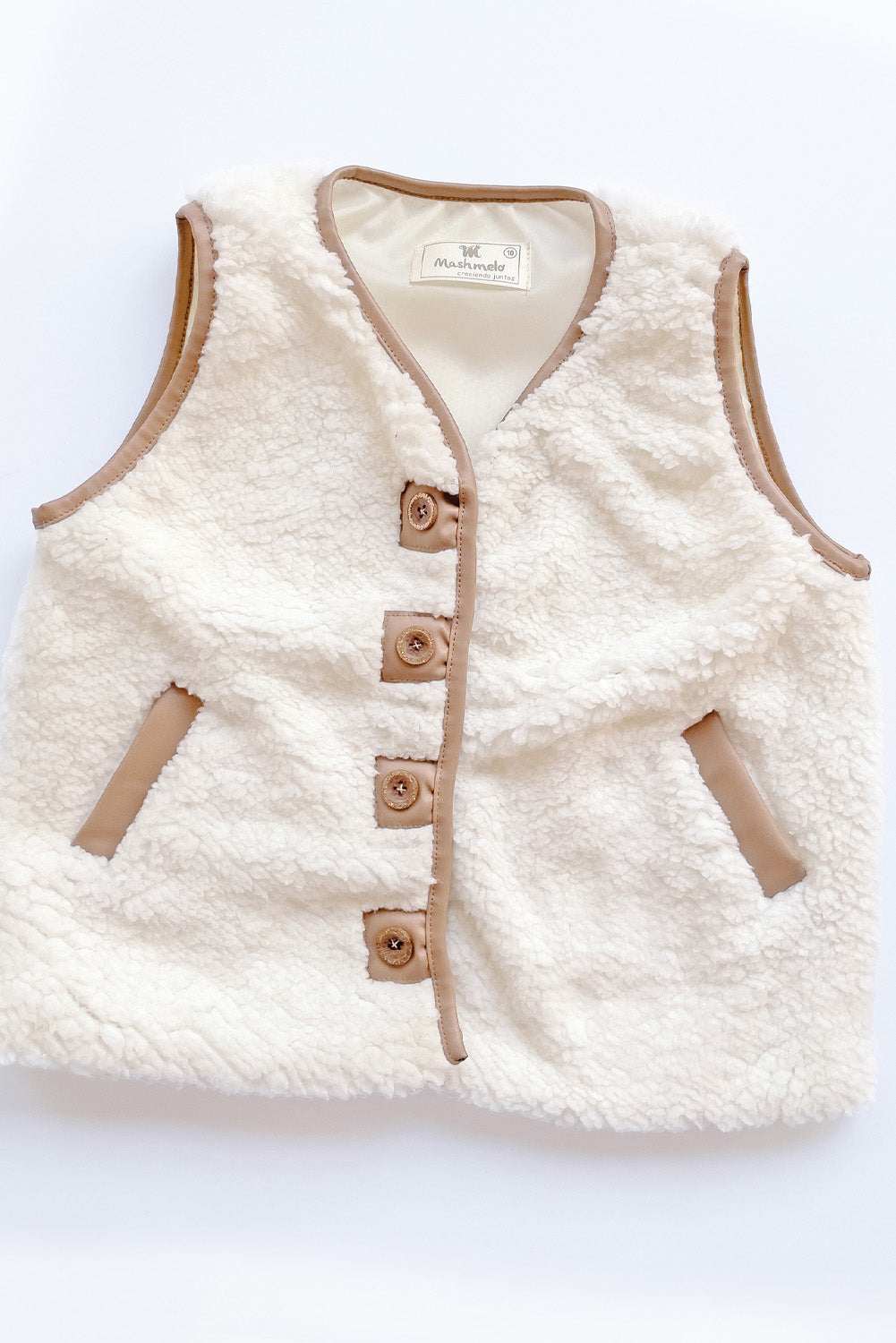 Chaleco corderito con detalles de cuerina
