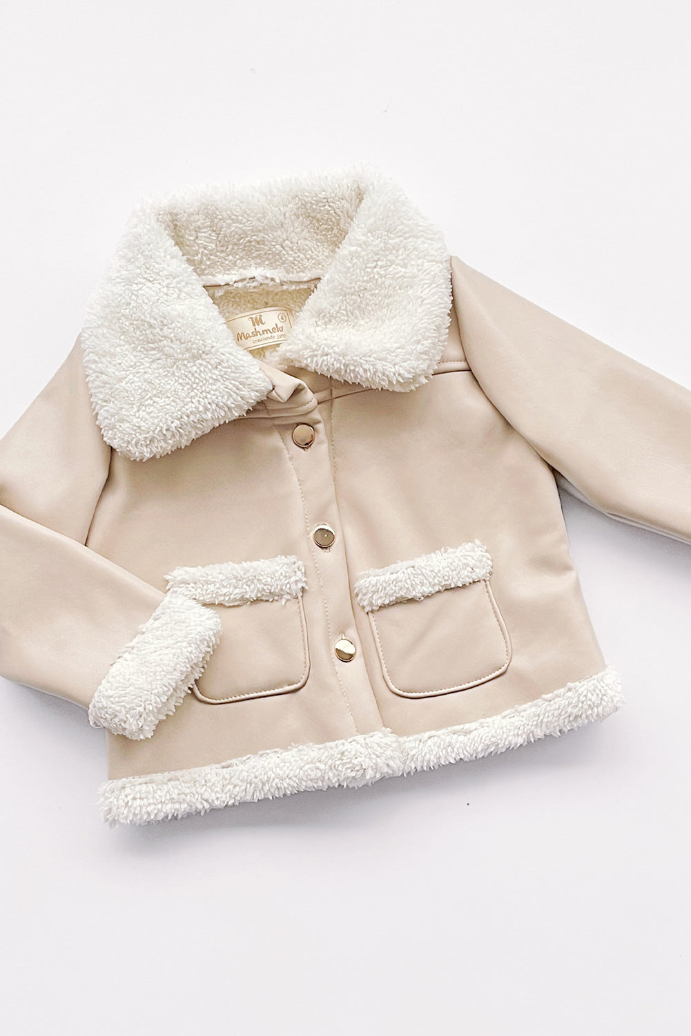 CHAQUETA DE CUERINA CARNERO DE CUELLO ALTO CON BOLSILLOS