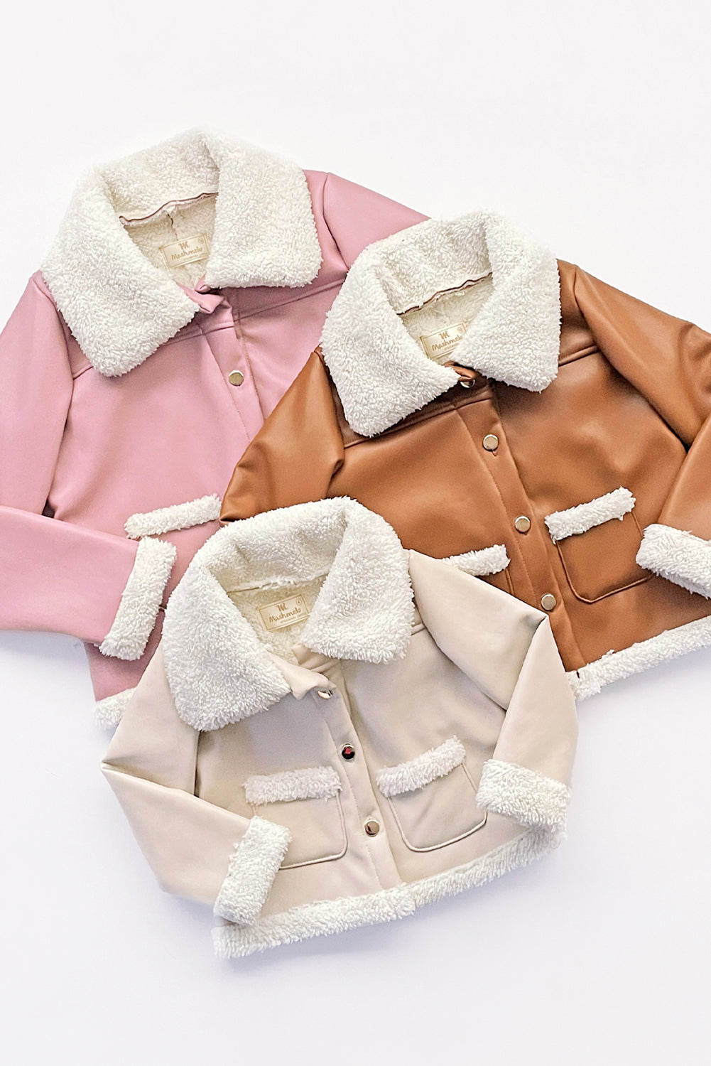 CHAQUETA DE CUERINA CARNERO DE CUELLO ALTO CON BOLSILLOS