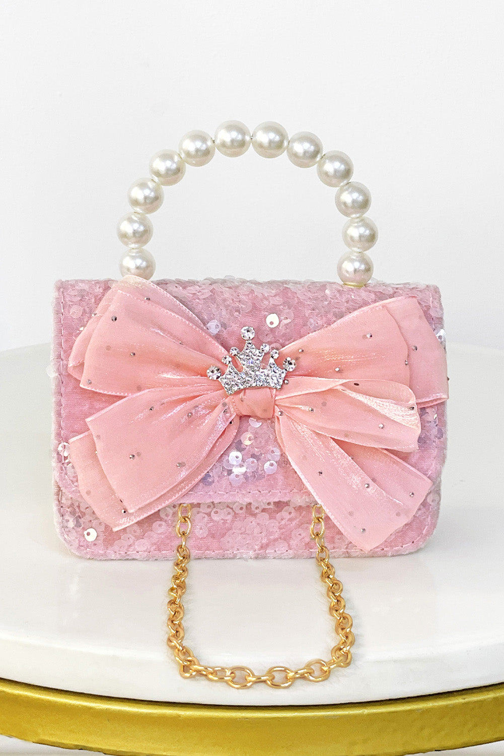Cartera con Lentejuelas y Detalle de Corona