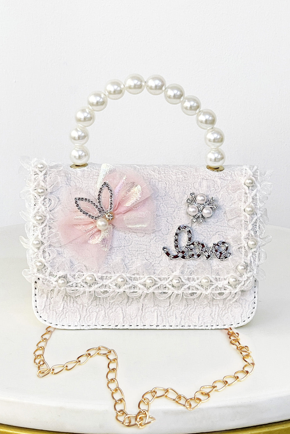 Cartera con Encaje Floral y Pedrería