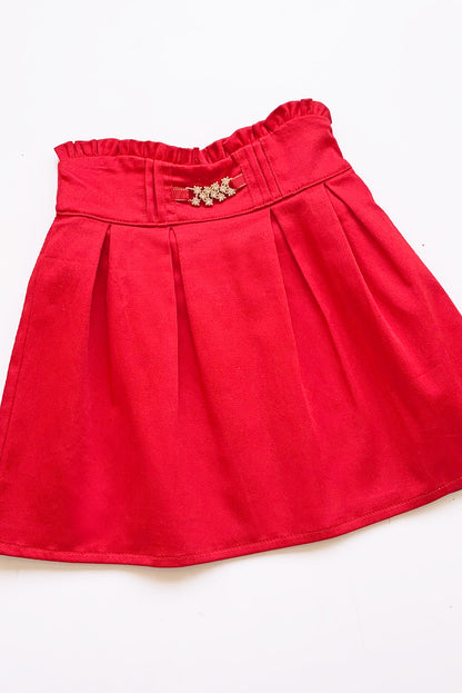 FALDA CON TABLEROS Y PASANTE CON STRASS EN PRETINA
