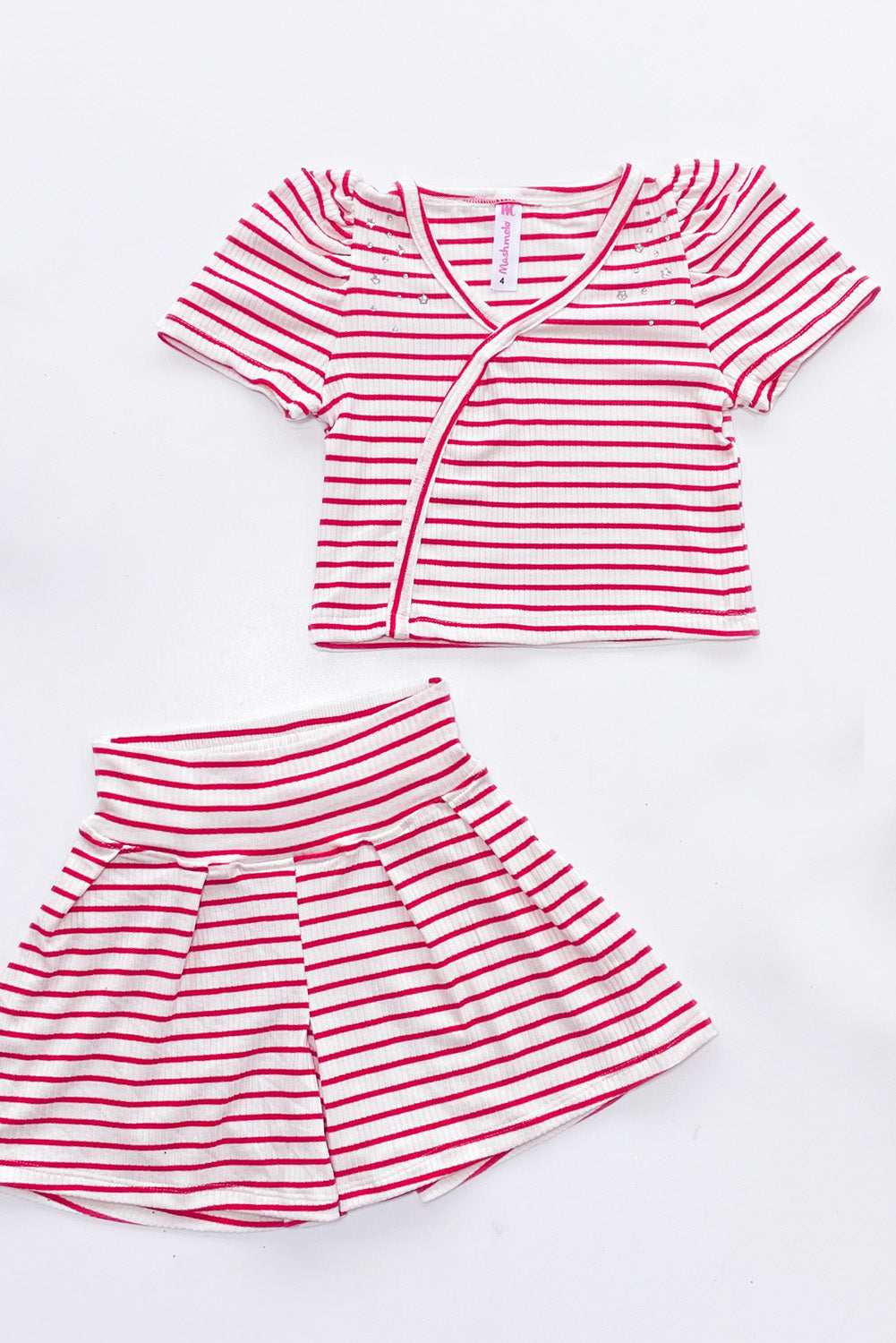 Set Polo Asimétrico  y Short con Pinzas