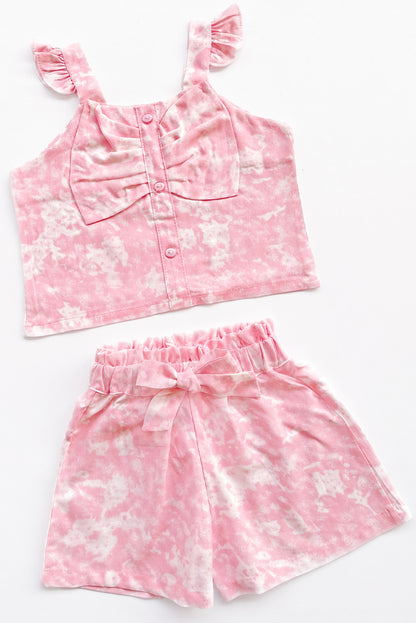 Set de blusa con forma de lazo en pecho y short con lazo en pretina