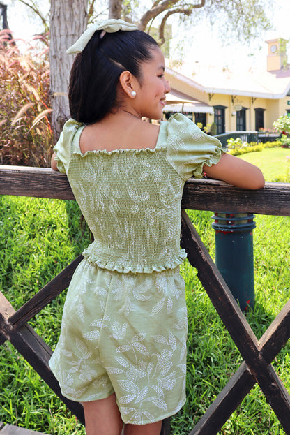 Set de blusa multiaguja y short con bolsillos