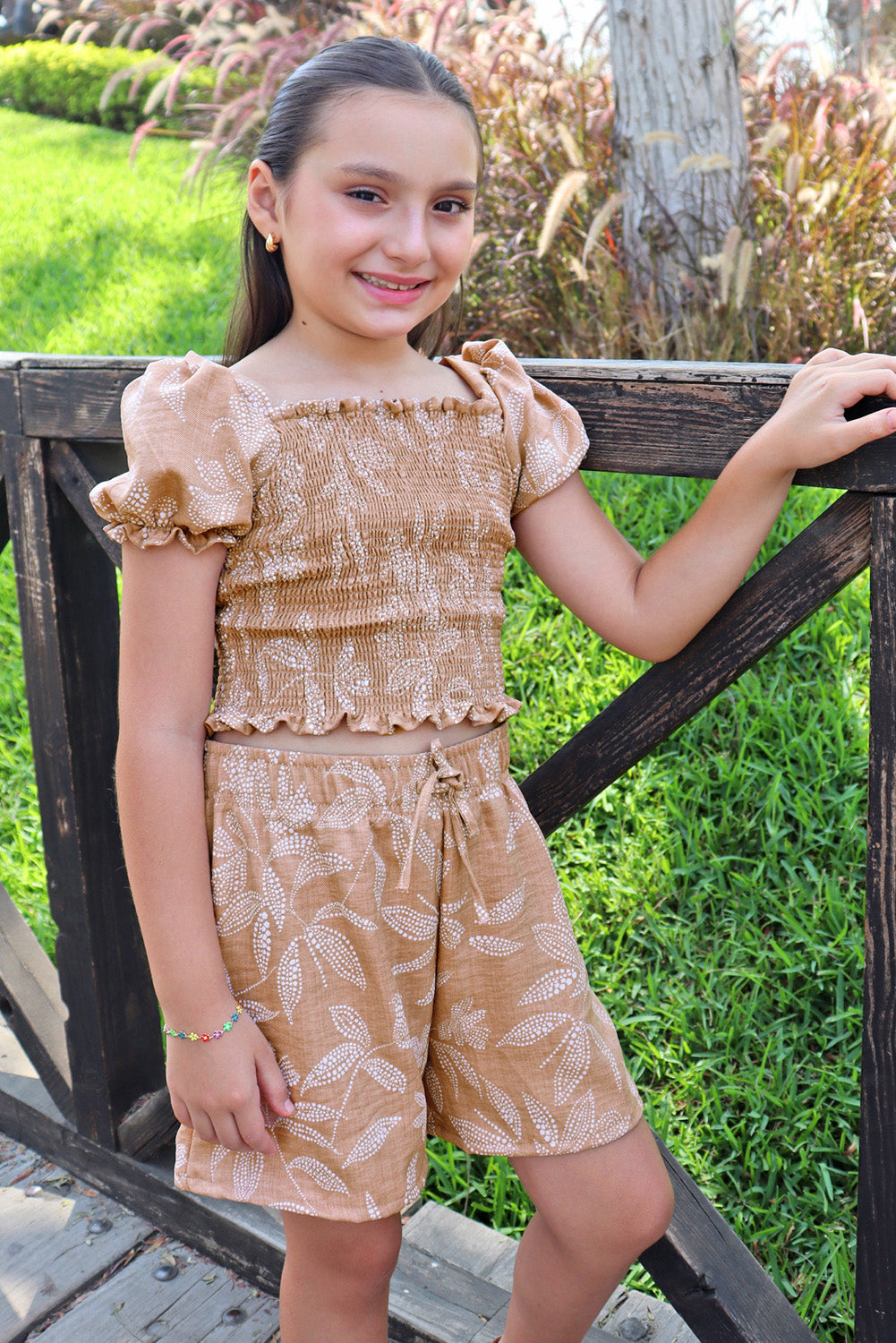 Set de blusa multiaguja y short con bolsillos