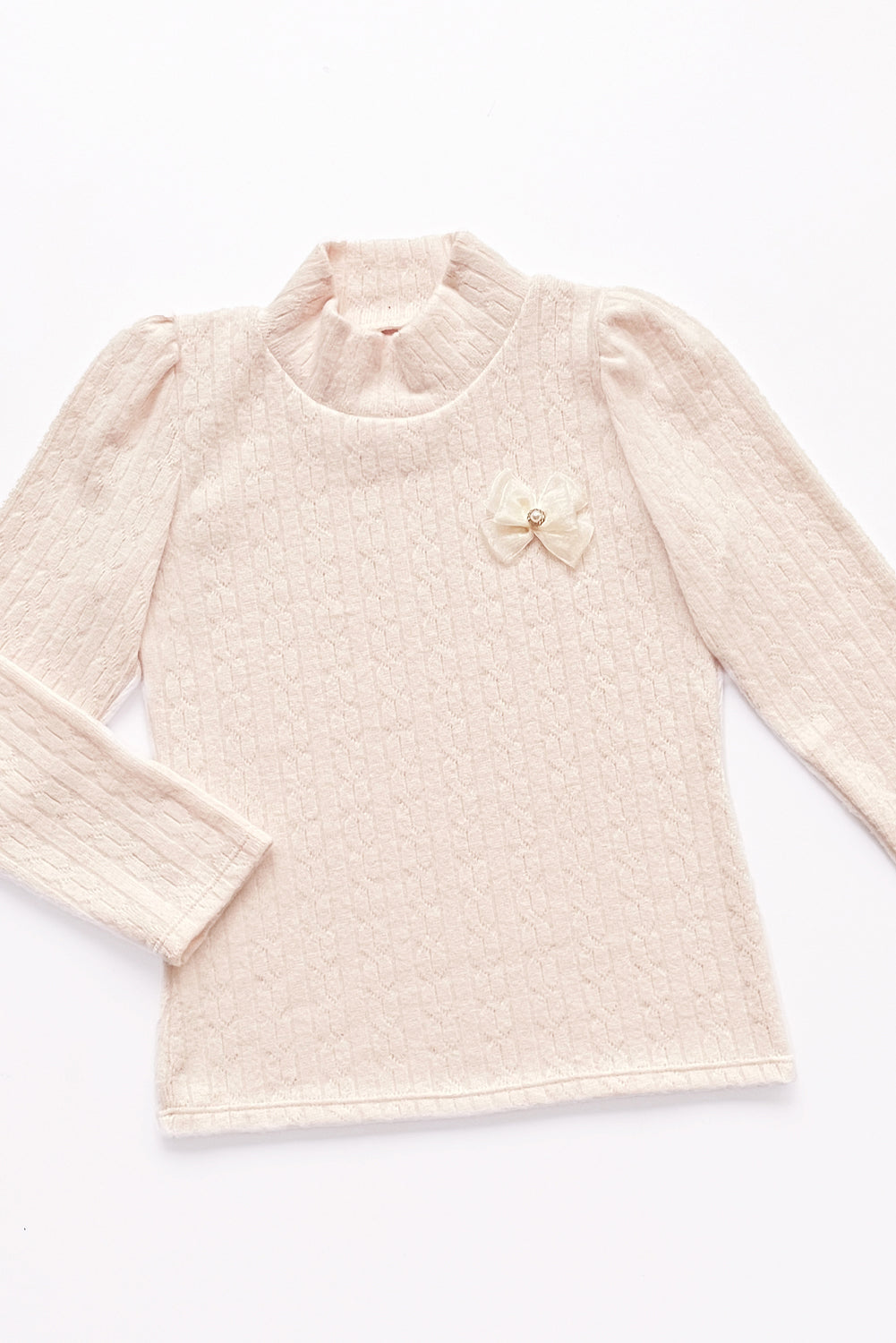 POLO CHOMPERO DE CUELLO ALTO CON LAZITO DE ORGANZA