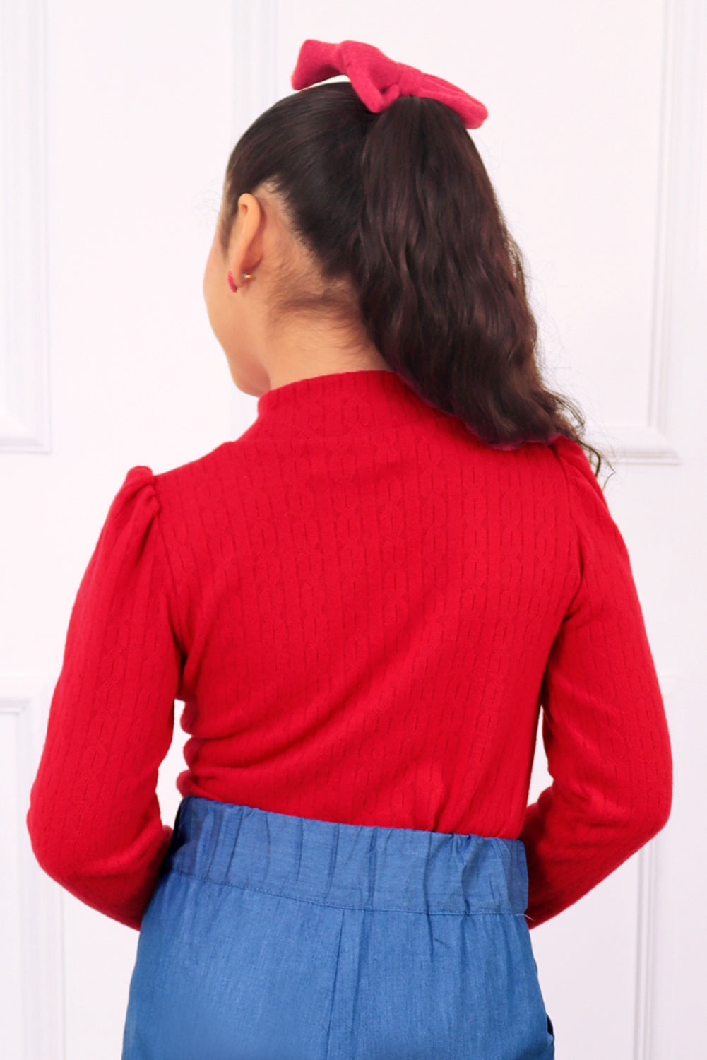 POLO CHOMPERO DE CUELLO ALTO CON LAZITO DE ORGANZA