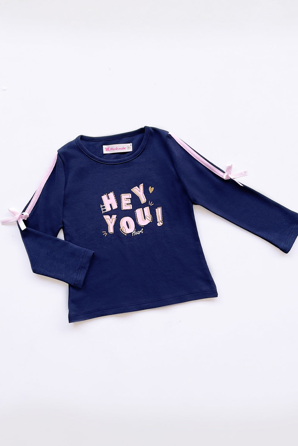 POLO ESTAMPADO CON TAPETE Y LAZITOS EN MANGAS
