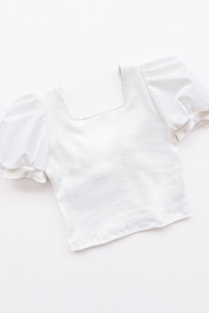 Top de rib de escote cuadrado con mangas tableadas y gran lazo en espada de popelina