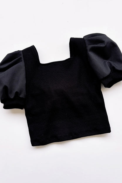 Top de rib de escote cuadrado con mangas tableadas y gran lazo en espada de popelina