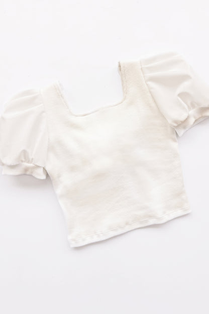 Top de rib de escote cuadrado con mangas tableadas y gran lazo en espada de popelina