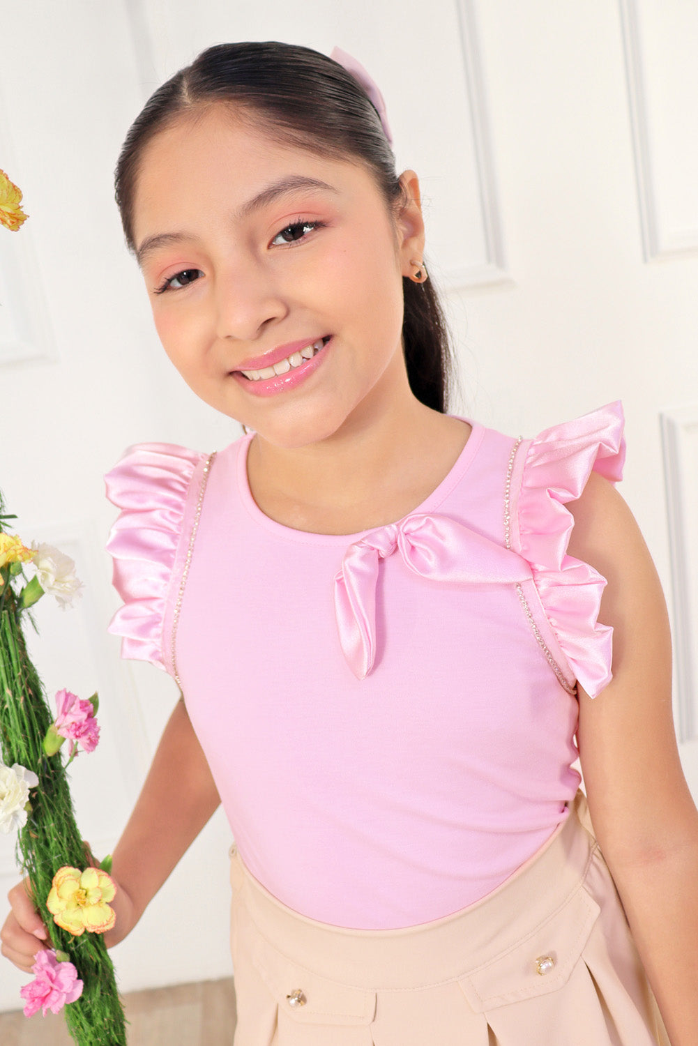 Polo con alitas de seda y strass