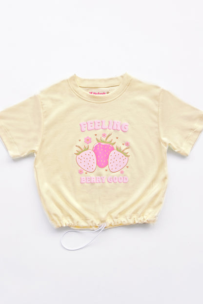 Polo oversize con estampado de fresas