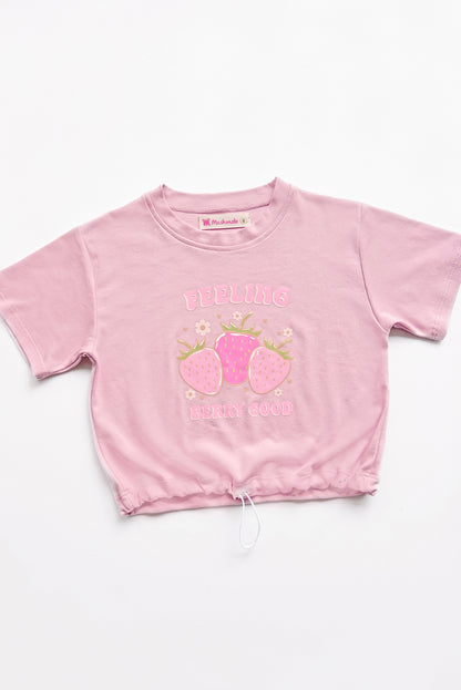 Polo oversize con estampado de fresas