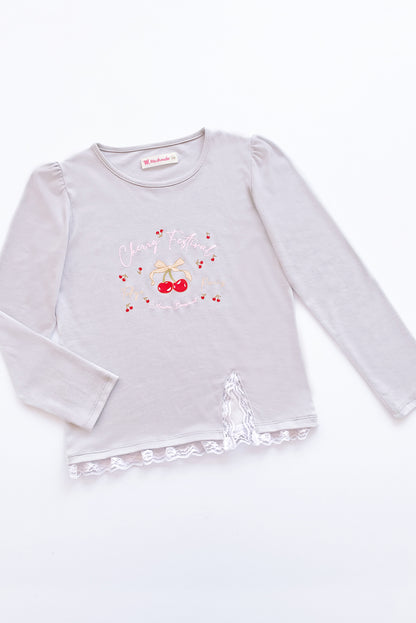 Polo con Estampado y Detalles de Greca Labrada
