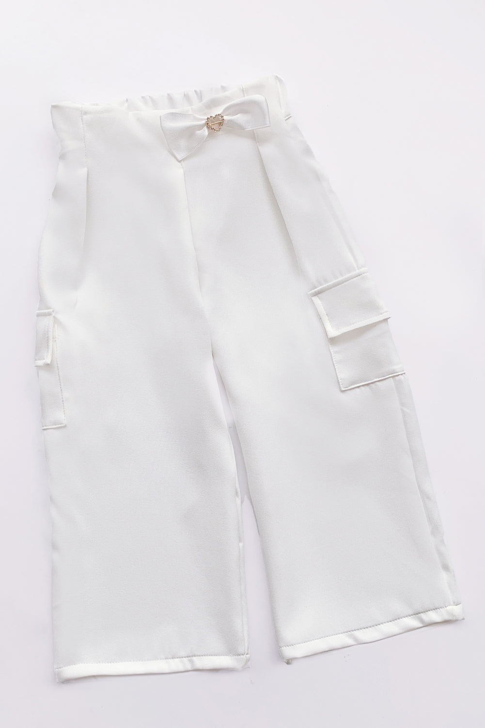PANTALON DE CATANIA CON PINZAS ASIMETRICAS PARA NIÑA