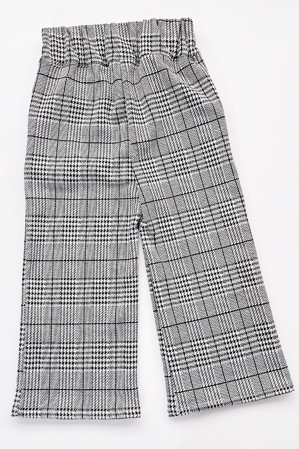 PANTALON EN PRINCIPE DE GALES CON CORTE V EN PRETINA