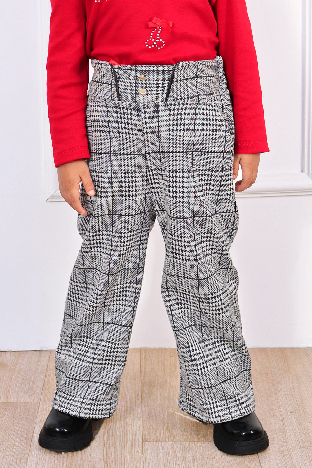 PANTALON EN PRINCIPE DE GALES CON CORTE V EN PRETINA
