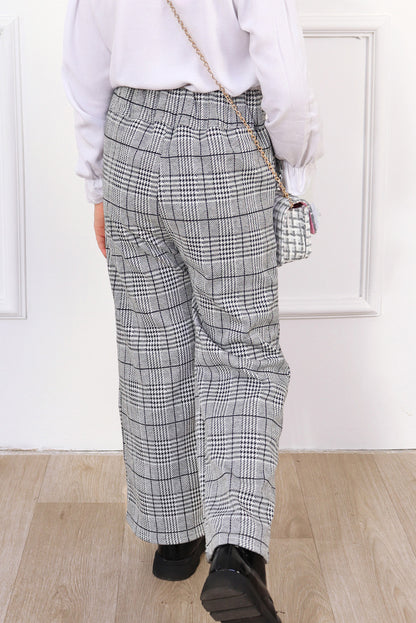 PANTALON EN PRINCIPE DE GALES CON CORTE V EN PRETINA