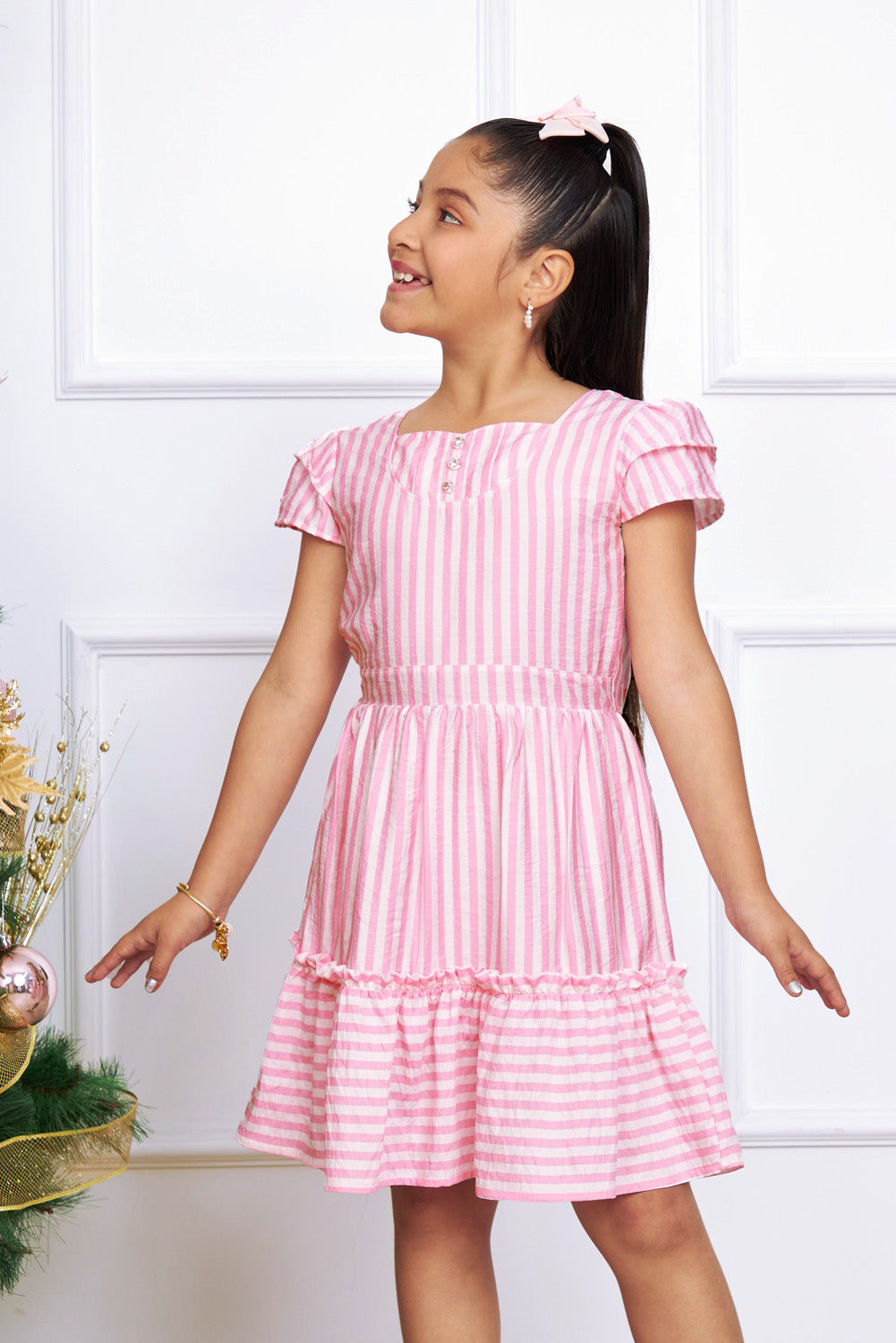 Vestido listado con dos tiempos en faldon y escote en forma de corazon
