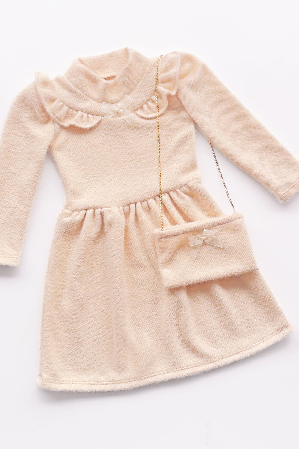 VESTIDO CHOMPERO DE CUELLO ALTO Y VOLANTES EN CANESU