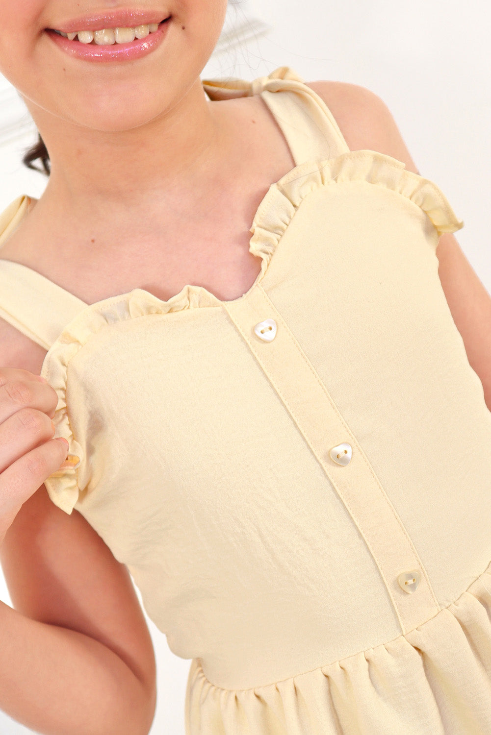 Vestido con elástico multiaguja y faldón dos tiempos con pechera en corpiño