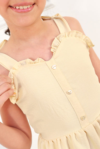 Vestido con elástico multiaguja y faldón dos tiempos con pechera en corpiño